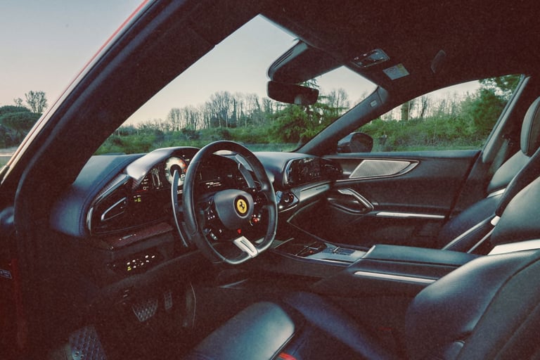 Interior view of a Ferrari Purosangue featuring a luxury leather cabin and carbon fiber dashboard.