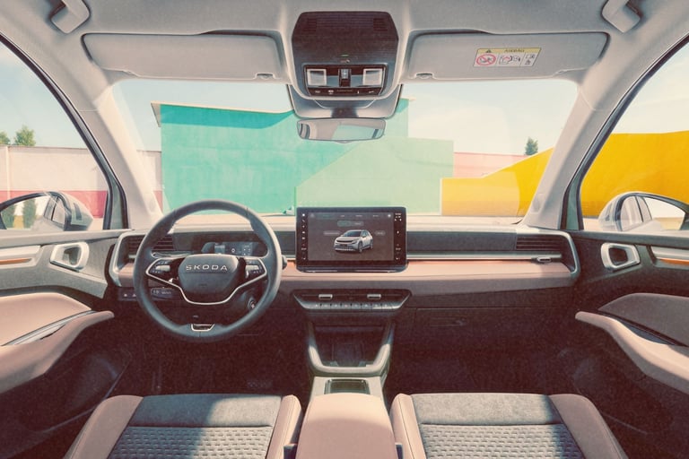 Modern interior of Skoda Epiq electric SUV featuring a digital cockpit and infotainment touchscreen