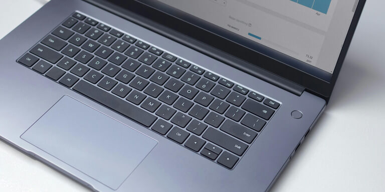 Optimizing business performance through data analysis on a laptop