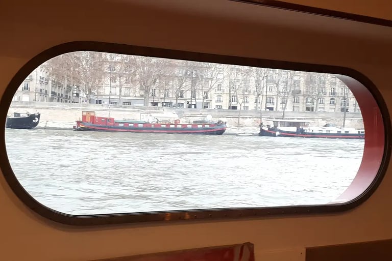 View of the river through an oblong ship window