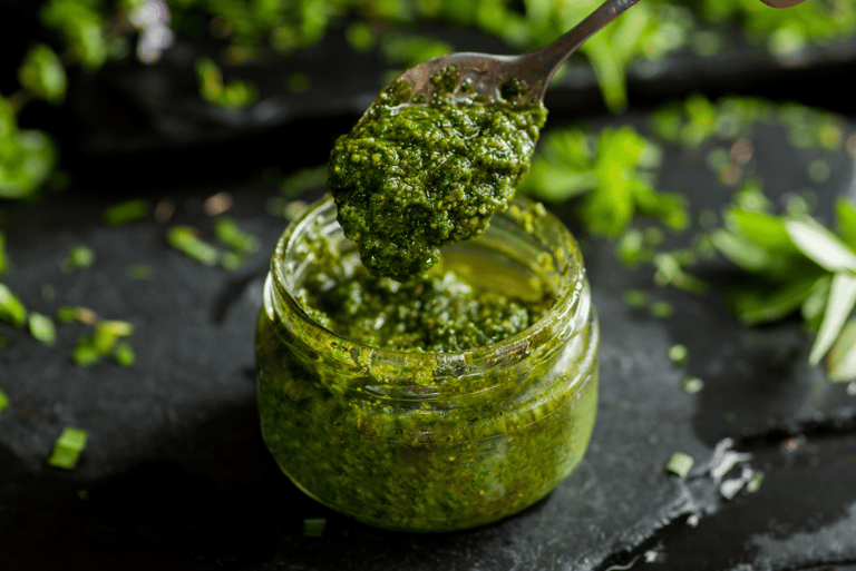 Jar of spinach basil pesto make with Thrive Freeze Dried Spinach