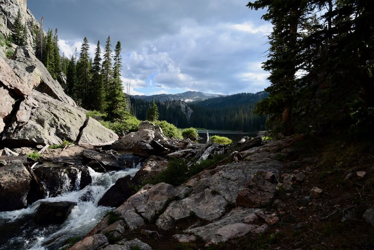 Mirror Lake Outlet in summer evening sunlight, Gore Range Rocky Mountains