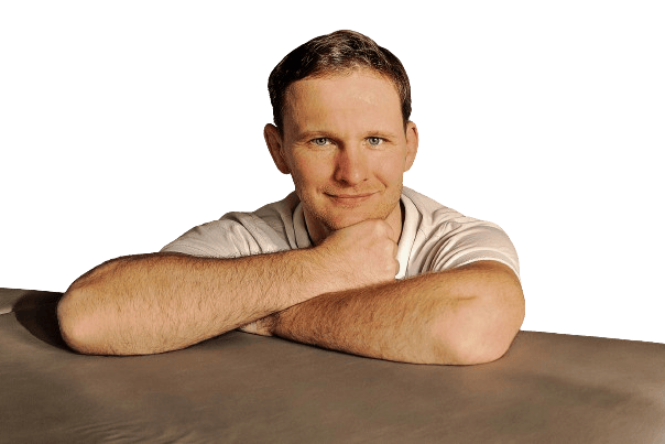 a massage therapist with a white shirts
