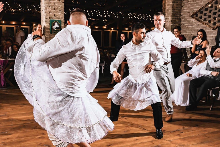 a couple of men and women dancing in a dance floor