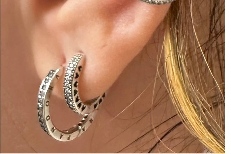 Stylish lobe piercing jewellery fitted with titanium studs