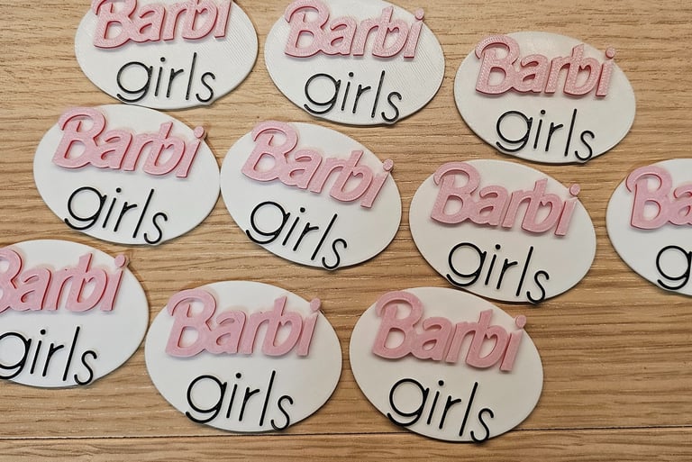 a number of baby shower signs on a table