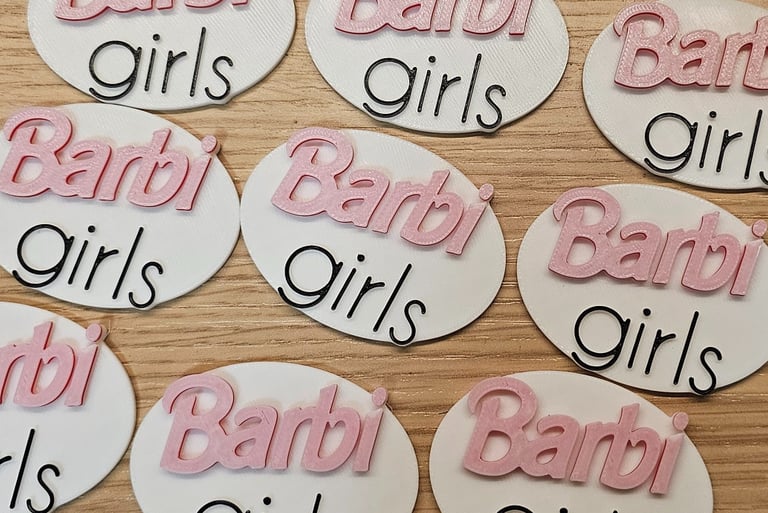 a number of baby shower signs on a table