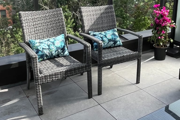 outdoor dining chairs with custom lumbar pillows