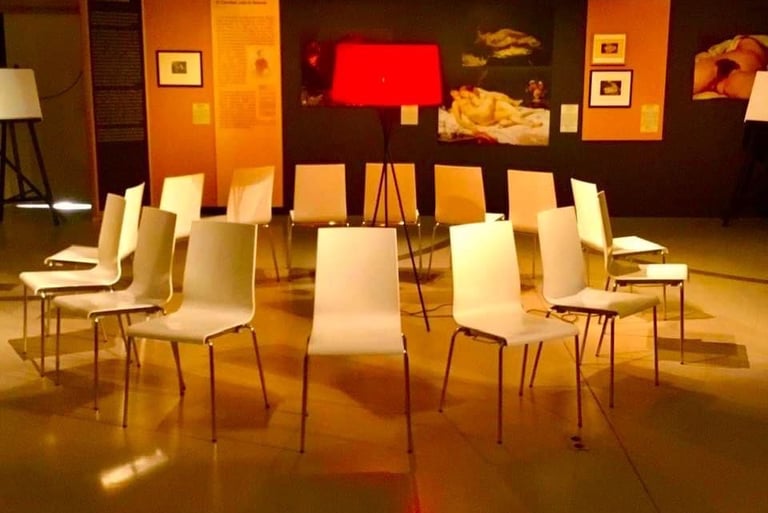 a circle of chairs with chairs and lamps