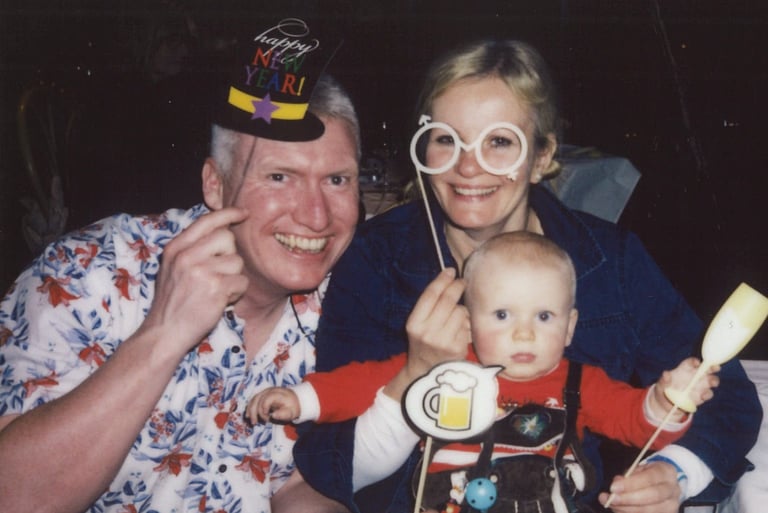 Happy family celebrating their first New Year's Eve