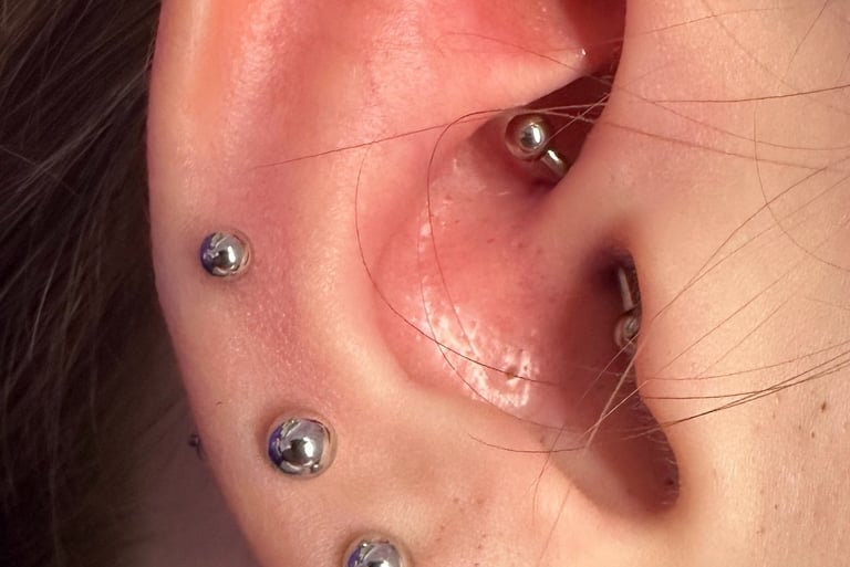 Expert rook piercing by Jooles in Stonehaven