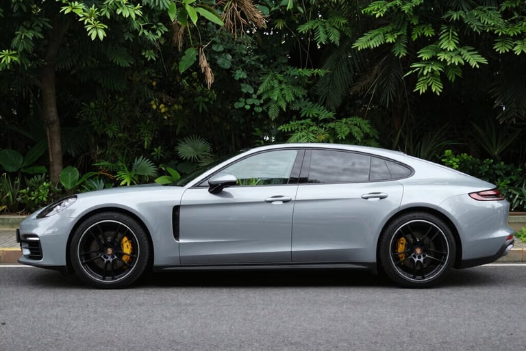a blue truck parked in a parking lot