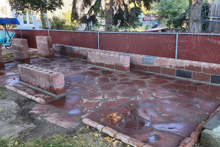 CMU patio sitting area and barbeque pedestal with red and charcoal CMU