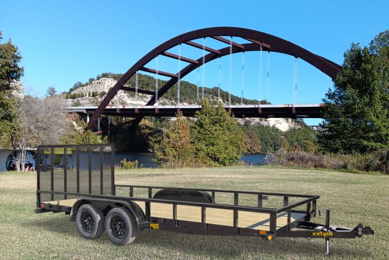Utility trailer parked in front of Austin's Pennybacker Bridgeiler rental resource in Austin. 