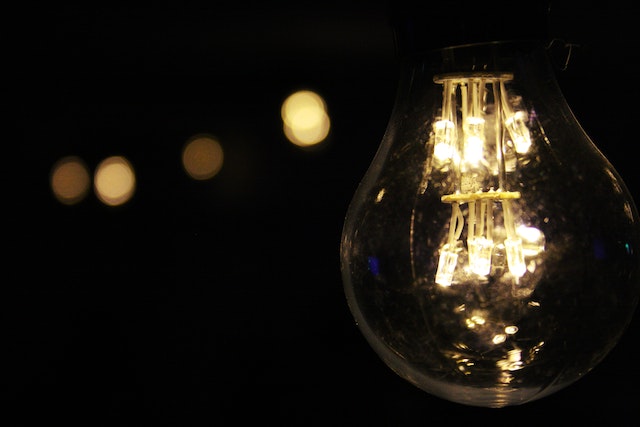 a light bulb hanging from a light bulb on a string light