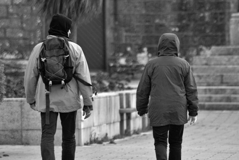 Two people walking together representing companionship through grief.