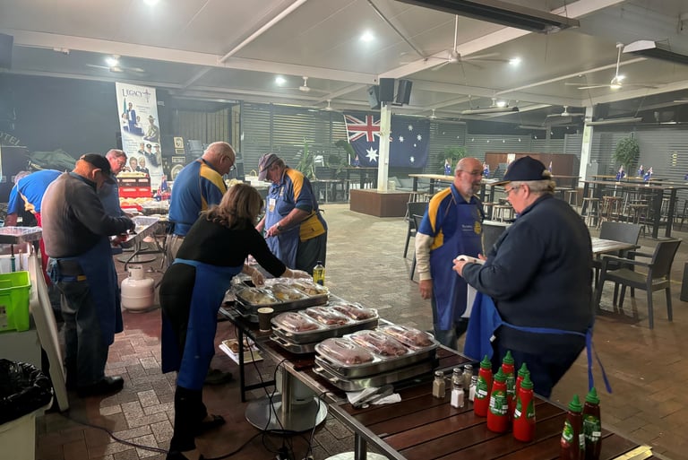 Rotarians and Legacy volunteers hard at work at Walsh's Hotel at 5:30am getting breakfast ready!