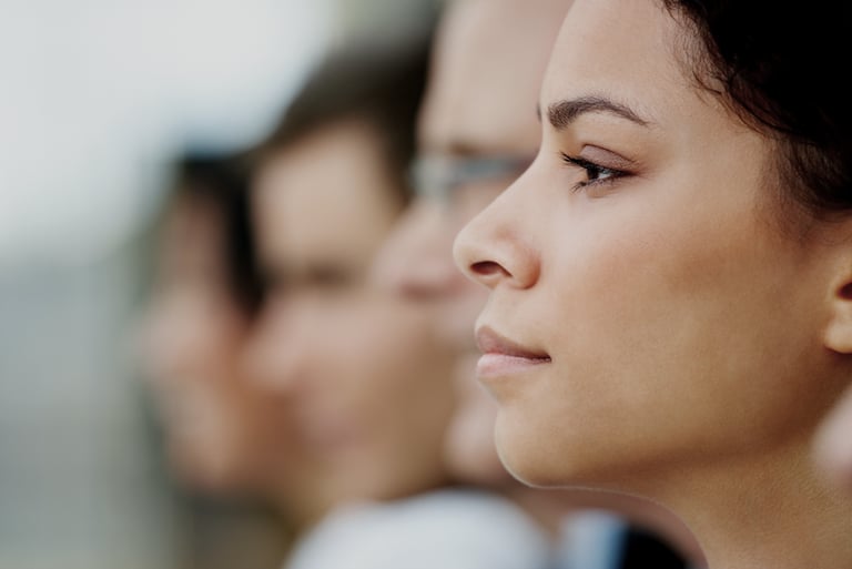Profile of serious female student in the classroom.