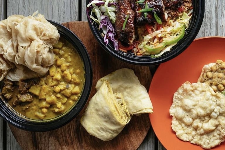 Buss up shut, curry goat with potato and channa. Also, doubles with Chinese style chicken.