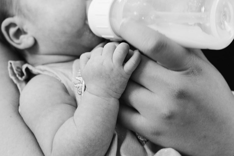 baby bottle-fed infant