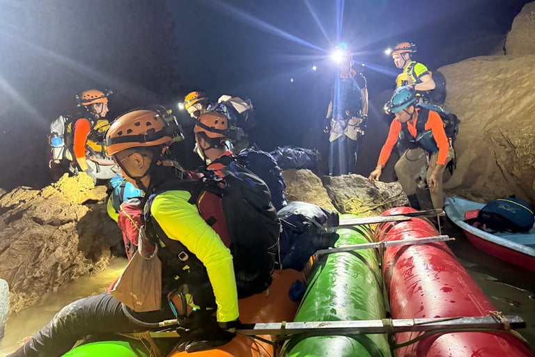 getting our shoes cleaned on rafts in passchendaele in hang son doong cave, vietnam