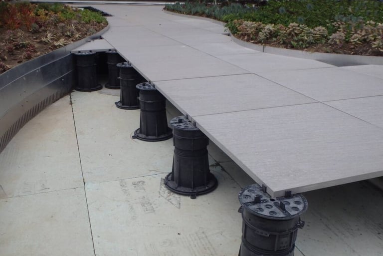 Tiles on adjustable height pedestals