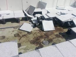 Tiles lifted by high wind