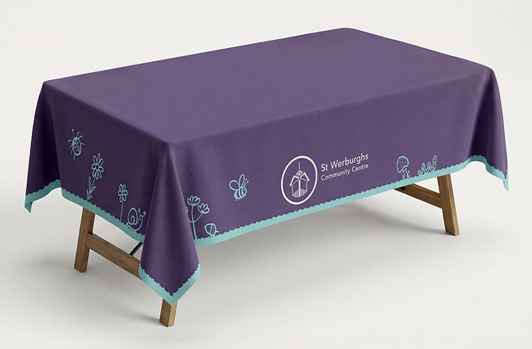 Bespoke tablecloth designed for St Werburghs using the new brand assets.