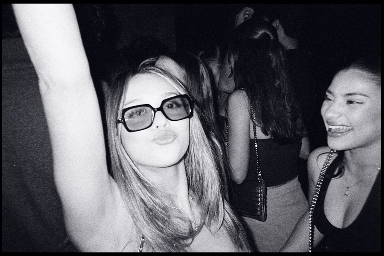 Girl dancing at Pass The Vibe party