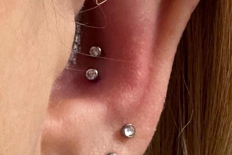 Titanium jewellery fitted for conch piercing in Montrose