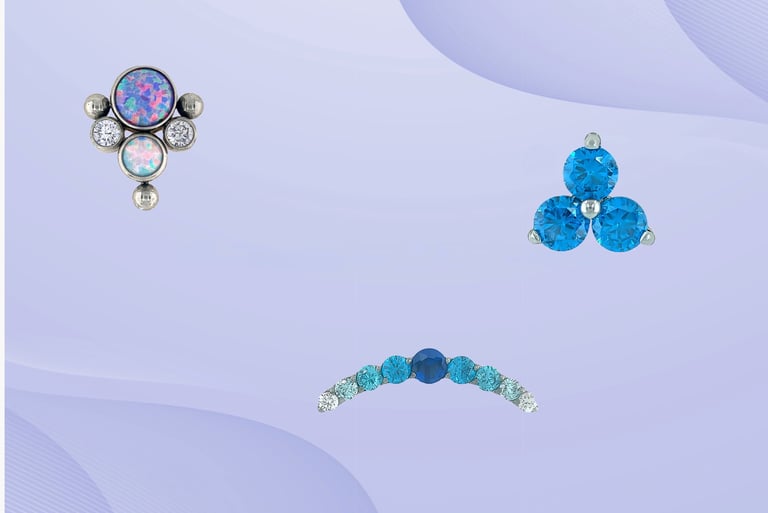Titanium belly bars and barbells available at Piercing by Jooles