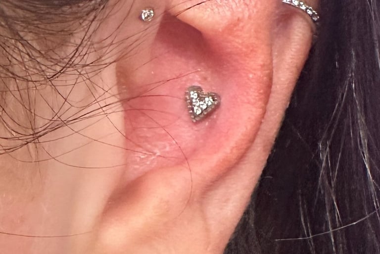 Stylish conch piercing jewellery fitted by Jooles