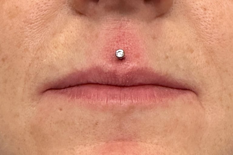Professional lip piercing in Montrose studio with sterile tools