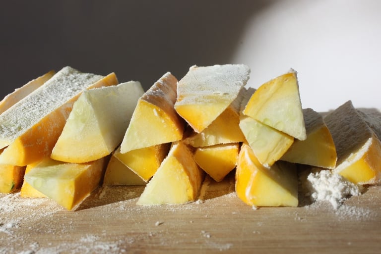 quartered zucchini covered in flour