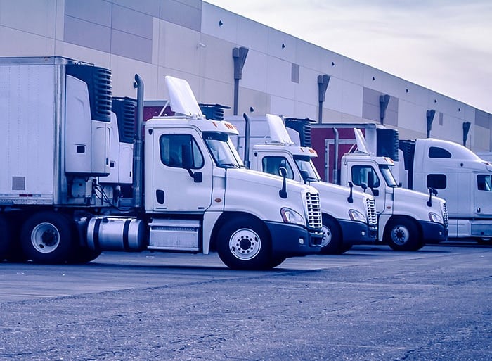 Surveillance system monitoring commercial truck yard to enhance security and track vehicle movement at distribution facility