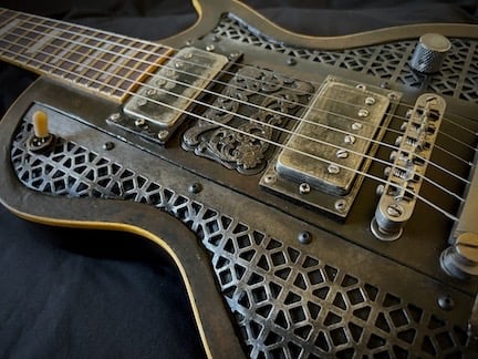 Silverback Ironbrand Les Paul style dark industrial guitar. Top angle view.