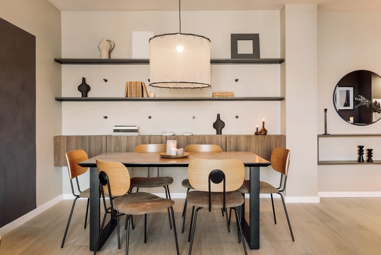 Contemporary dining area with bold color accents and clean lines design by SAVIA