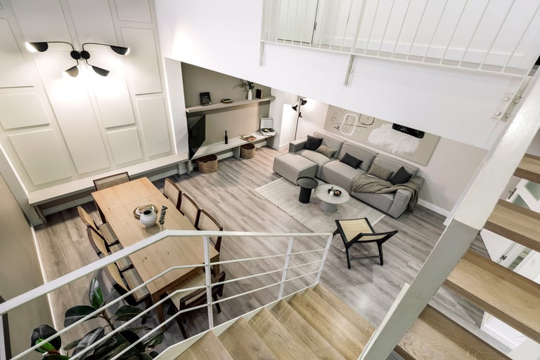 Contemporary loft apartment with a minimalist design, subtle lighting, neutral colors in Barcelona