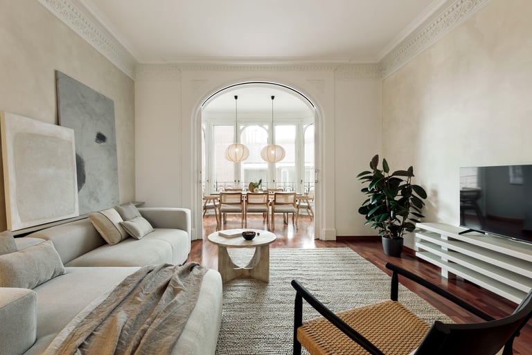 Sophisticated Living room with modern decor, natural materials, and a neutral color palette and art