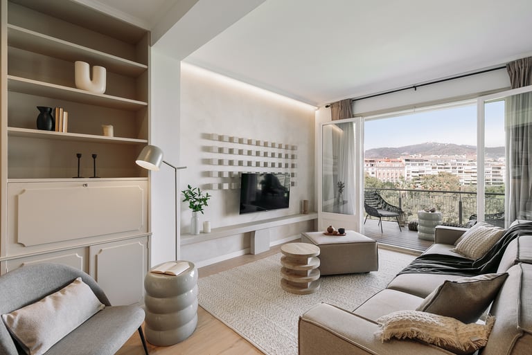 Elegant living room with bespoke wall installation, neutral tones, and subtle textures by SAVIA
