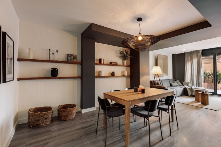 Stylish dining area with contemporary furniture, neutral tones, and a cozy interior design by SAVIA 