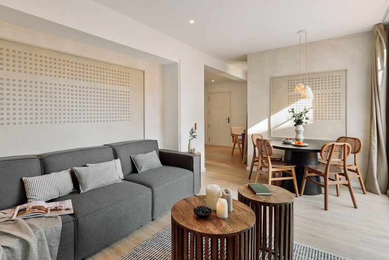 Elegant living room with contemporary design, large windows, wood elements in Barcelona