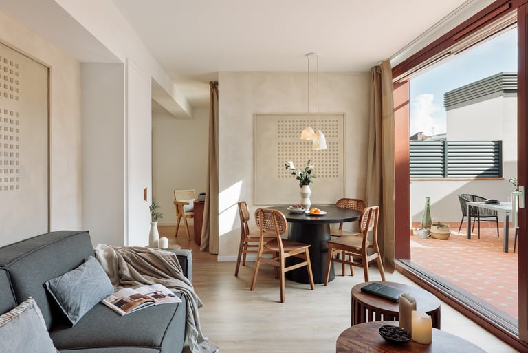 Elegant living room with contemporary design, large windows, wood elements in Barcelona