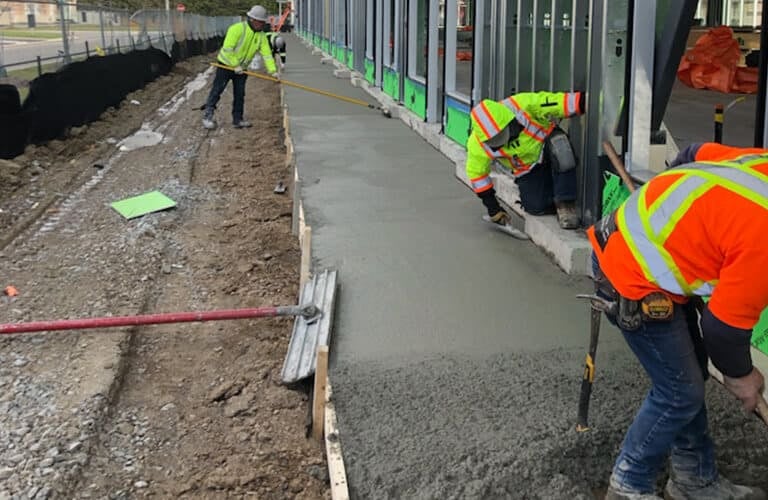 concrete contractors installing stamped concrete