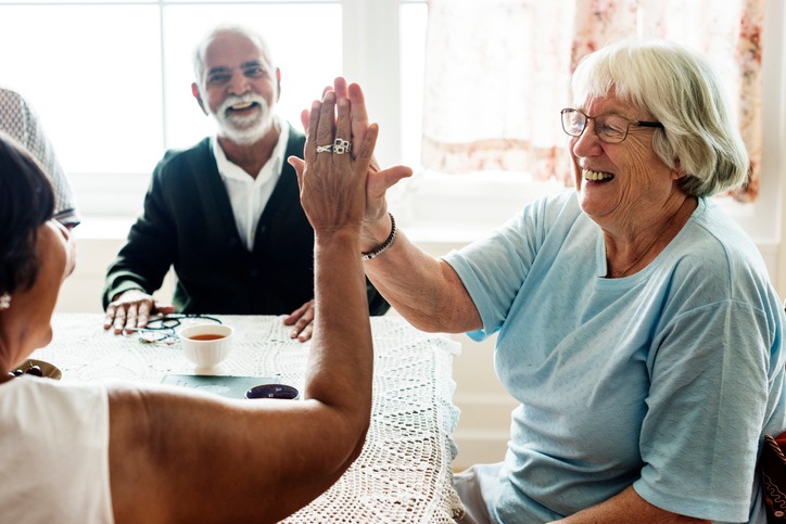 mature adults meeting in community group