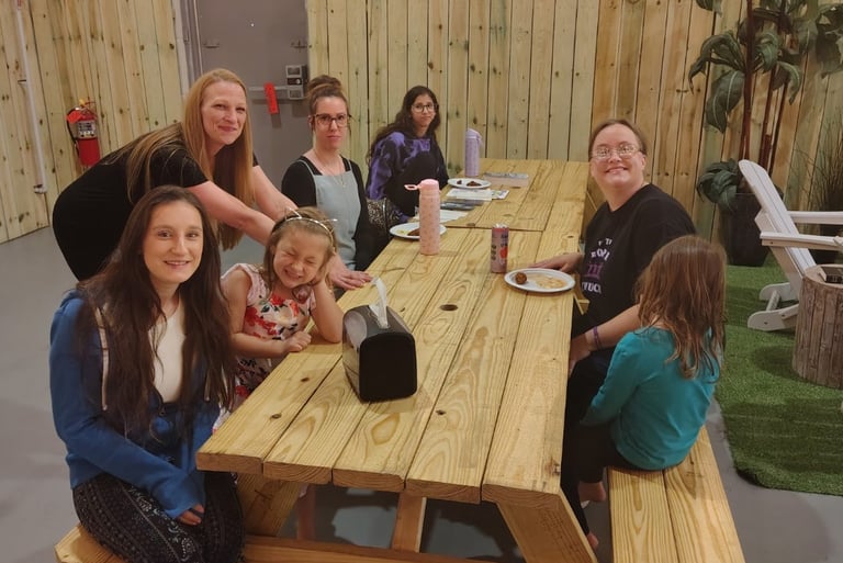 The women eating snacks after our Sunday church service