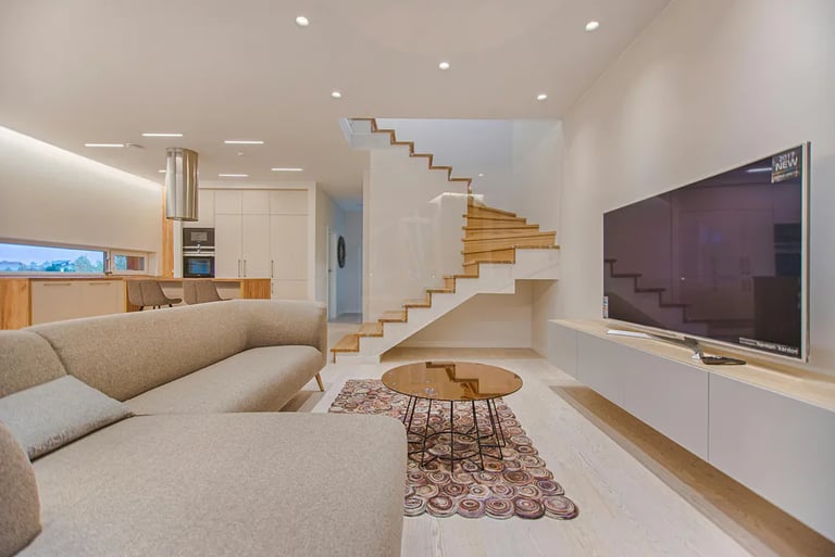 modern luxury home basement living room with large tv