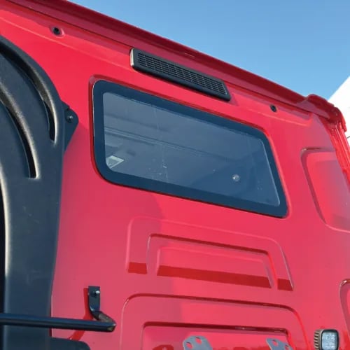 small window of the red truck