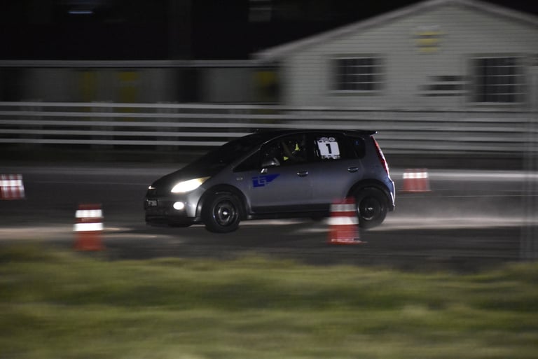 photo showing tarmac takeover winning 2wd car. charlie thomas mitsubishi colt