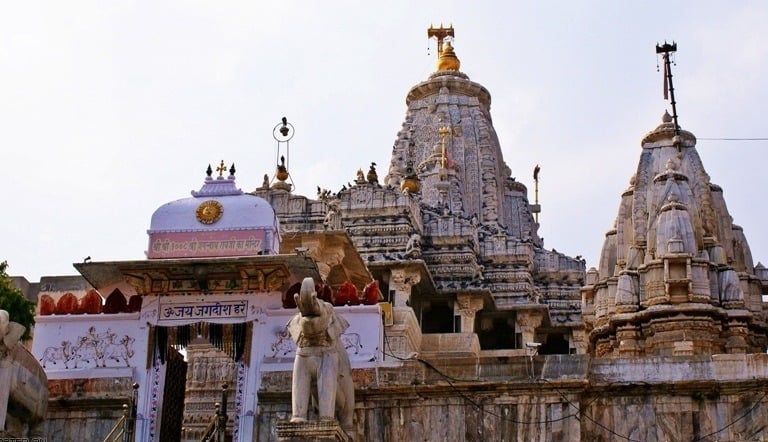 The ornate Jagdish Temple in Udaipur featuring stone elephant statues and traditional Hindu architecture.
